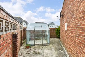 Side Garden with Green House - click for photo gallery